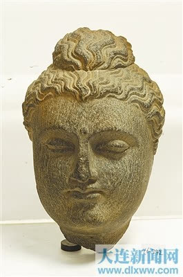 跟着石雕佛头像感受古代文化